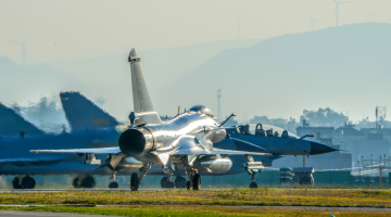 J-10 fighters taxi in close formation 