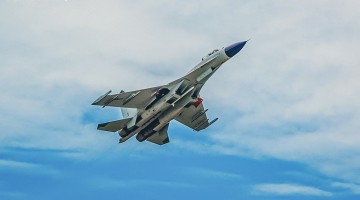 Naval fighter jets in flight training 