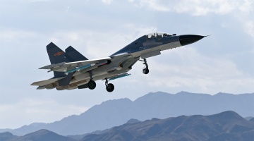 Fighter jets fly over mountains