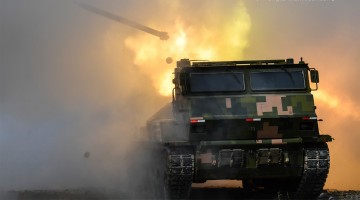 Vehicle-mounted multiple launch rocket system fires at mock target 