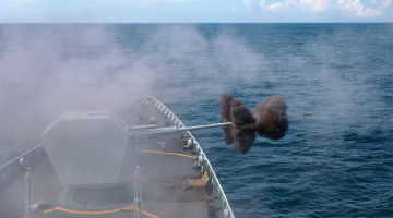 Warships fire at targets in real-combat training