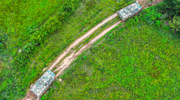 Armored vehicles en route to training field