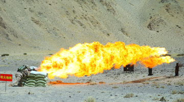  Flamethrower operator ignites controlled fire