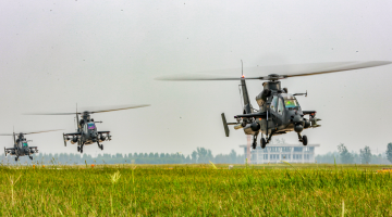 Army helicopters lift off