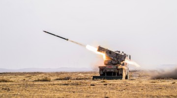 Mine-laying vehicle in live-fire training