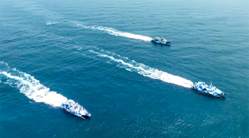 Missile boats sail in formation
