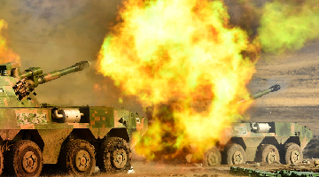 Self-propelled howitzers spit fire