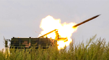 Vehicle-mounted rocket launcher fires at mock targets