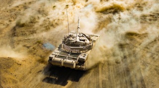 Main battle tank fires at mock targets