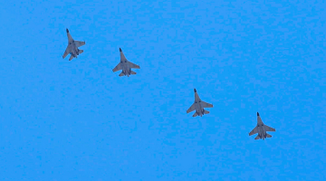 Fighter jets fly in formation
