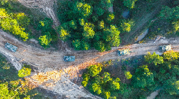 Tanks maneuver on muddy road