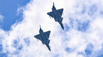 J-10 multi-role fighter jets participate in flight training