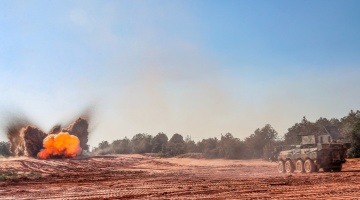 Minesweeping vehicle fires minesweeping explosive device