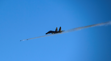 J-16 fighter jets fire at simulated targets