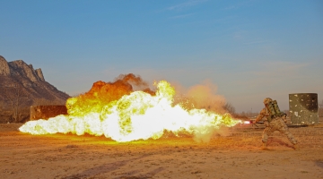 Soldiers Shoot with Flamethrower