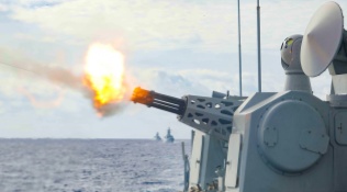 Frigates Conduct Live-Fire Training at Sea