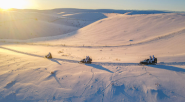 Soldiers patrol border area on snowmobiles