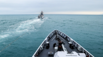 Frigates conduct astern replenishment maneuver