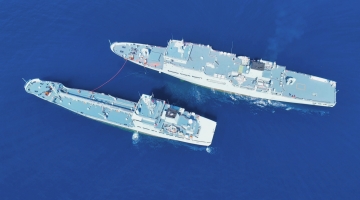  Water tanker and troopship practice replenishment-at-sea