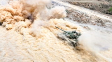 Type 96 tanks in drill of shooting on the move