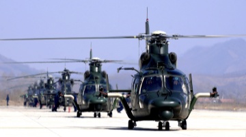 Multiple helicopters engage in flight training