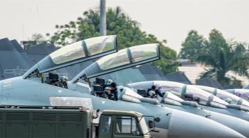 J-16 fighter jets engage in flight training