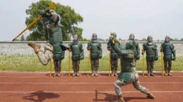 Soldiers practice bayonet fighting skills