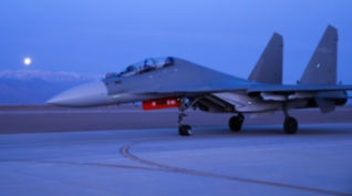 J-16 fighter jet in nighttime training