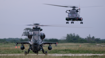 Multiple helicopters participate in flight training