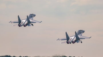 J-16 fighter jets engage in air-combat training