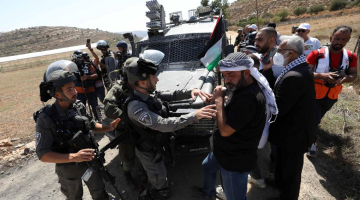 Palestinian protesters clash with Israeli soldiers in Mideast
