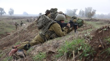 Israeli soldiers take part in military drill in Golan Heights