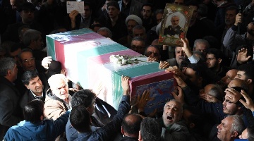 People attend funeral of victim killed in twin bombings in Kerman, Iran
