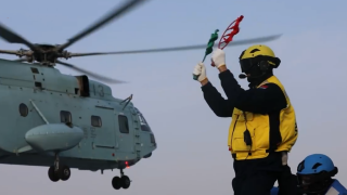 Helicopter training exercise on amphibious assault ship Anhui