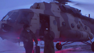 PLA Army helicopters send supplies to Xinjiang in a blizzard