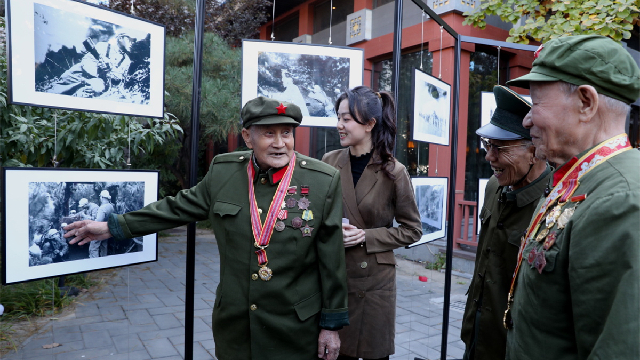 War veterans revisit old photos at exhibition