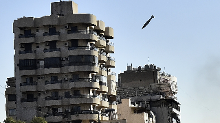 Eleven-story building toppled as Israel keeps up strikes in Lebanon