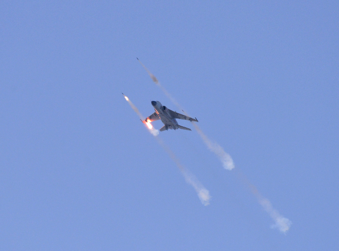 A JH-7 fighter-bomber fires air-to-surface missiles at simulated targets during a live-fire training exercise. The JH-7 fighter-bombers attached to an aviation regiment with the North China Sea Fleet under the PLA Navy conducted a live-fire training exercise on July7, 2016. A JH-7 fighter-bomber fires air-to-surface missiles at simulated targets during a live-fire training exercise. The JH-7 fighter-bombers attached to an aviation regiment with the North China Sea Fleet under the PLA Navy conducted a live-fire training exercise on July7, 2016.