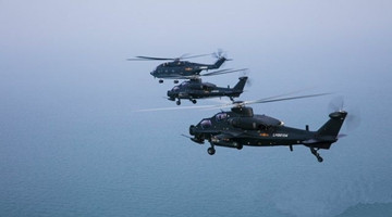 WZ-10 attack helicopters conduct training in South China Sea