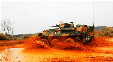 Type-92 wheeled IFV wades through ford