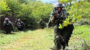 Special operations soldiers conduct tactical movement
