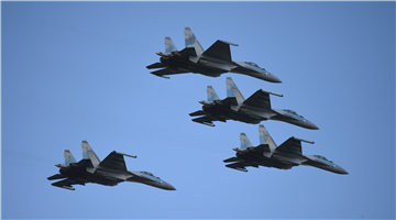 Su-35 fighter jets fly in formation