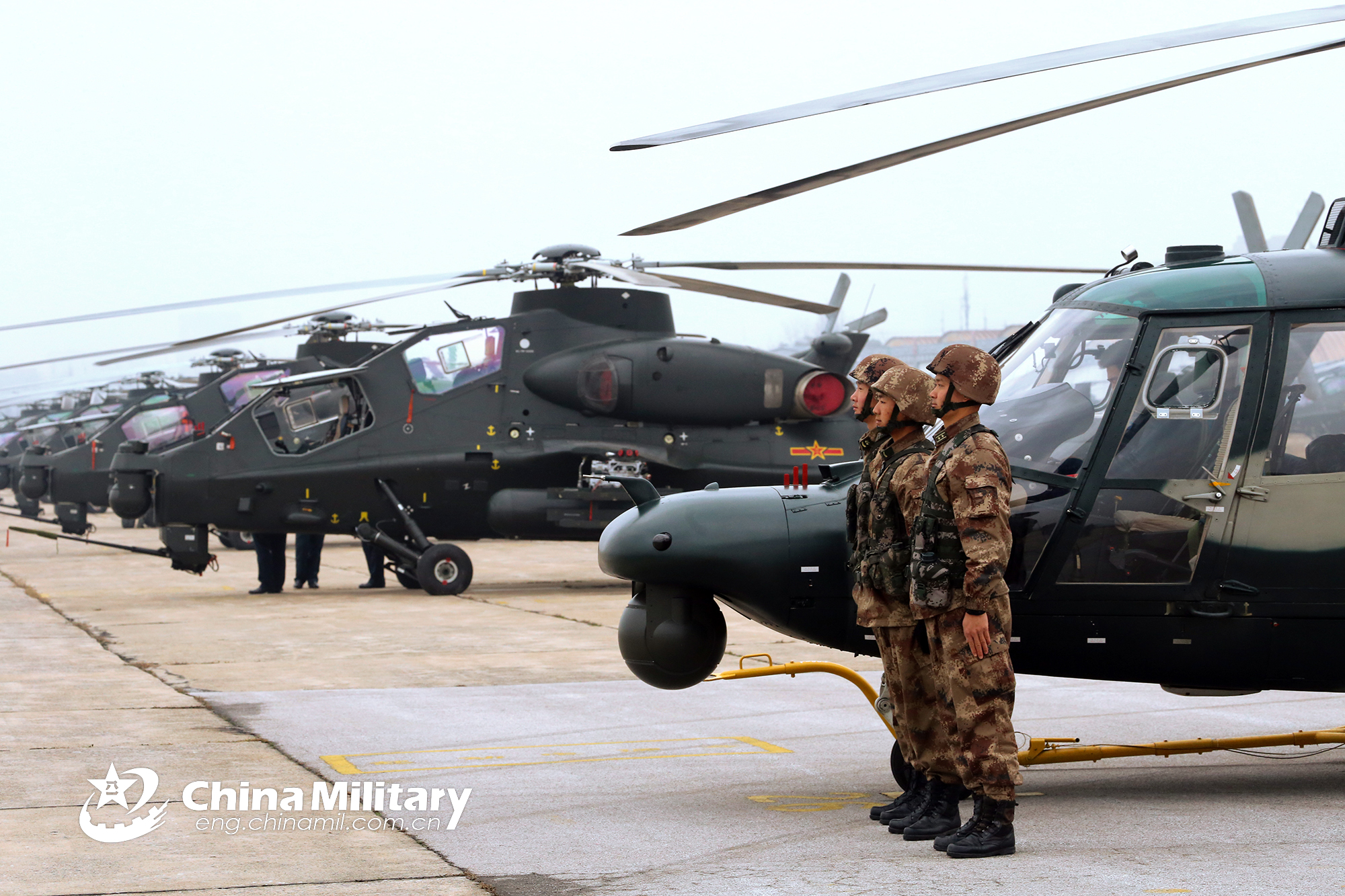 Wz 10 Attack Helicopters Sit In Front Of Aircraft Hangars China Military