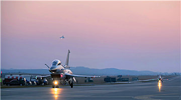 J-10 fighter jets taxi on the runway