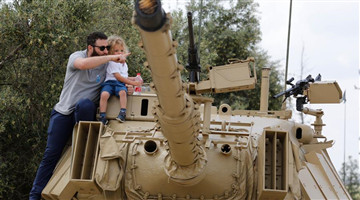People visit Israeli Armoured Corps Memorial in Latrun on Memorial Day