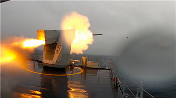 Frigate Dingzhou in maritime live-fire training