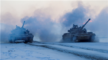 Tanks test combat fighting skills on snowy road