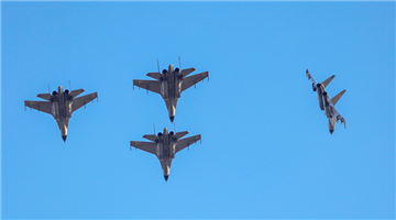 Fighter jets fly in diamond formation