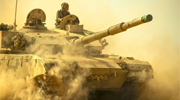 Tanks maneuver in driving training for armored forces