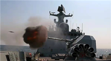 Frigate Yangzhou conducts combat training at sea